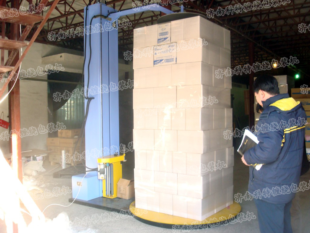 自動(dòng)壓頂型托盤(pán)纏繞包裝機(jī)